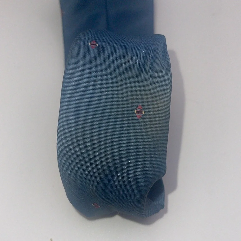 Christian Dior men’s tie. Polyester/silk blend.